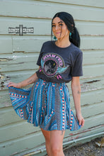 Load image into Gallery viewer, western apparel, western graphic tee, graphic western tees, wholesale clothing, western wholesale, women&#39;s western graphic tees, wholesale clothing and jewelry, western boutique clothing, western women&#39;s graphic tee, band style graphic tee, desert scene graphic tee, cactus, desert scene, bright graphic tee, colorful graphic tee, neon graphic tee, colorful western graphic tee, western desert scene graphic tee, roam free, band tee inspired
