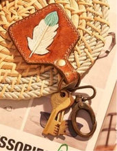 Load image into Gallery viewer, Feather Cowtag Purse Charm / Key Chain
